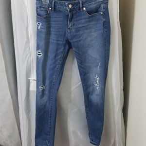 Petite distressed ankle jeans